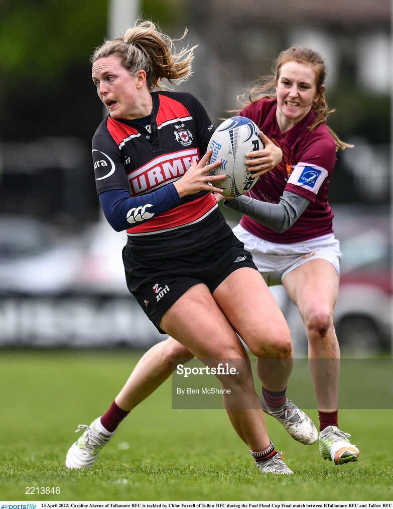 23 April 2022; Caroline Aherne of Tullamore RFC is tackled by Chloe Farrell of Tullow RFC during the Paul Flood Cup Final match between BTullamore RFC and Tullow RFC at Ollie Campbell Park, Old Belvedere RFC in Dublin. Photo by Ben McShane/Sportsfile