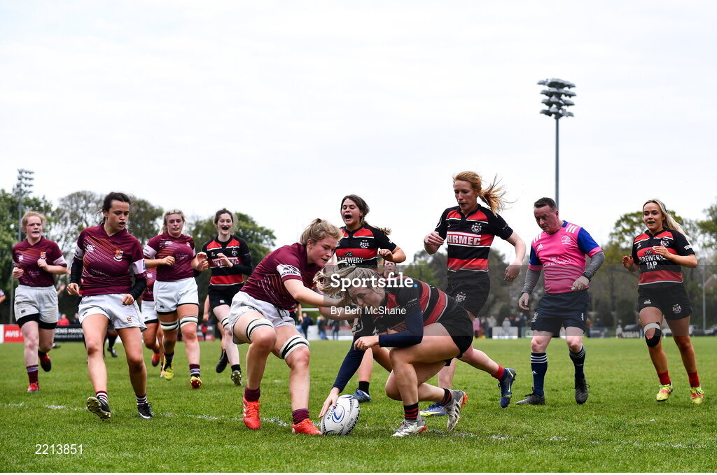 23 April 2022; Caroline Aherne of Tullamore RFC scores a try despite Katie O’Brien of Tullow RFC during the Paul Flood Cup Final match between BTullamore RFC and Tullow RFC at Ollie Campbell Park, Old Belvedere RFC in Dublin. Photo by Ben McShane/Sportsfile