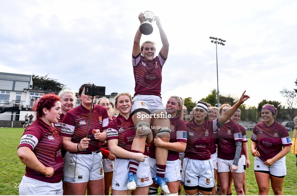 23 April 2022; Tullow RFC players lift captain Lana Brennan as they celebrate their victory in the Paul Flood Cup Final match between BTullamore RFC and Tullow RFC at Ollie Campbell Park, Old Belvedere RFC in Dublin. Photo by Ben McShane/Sportsfile