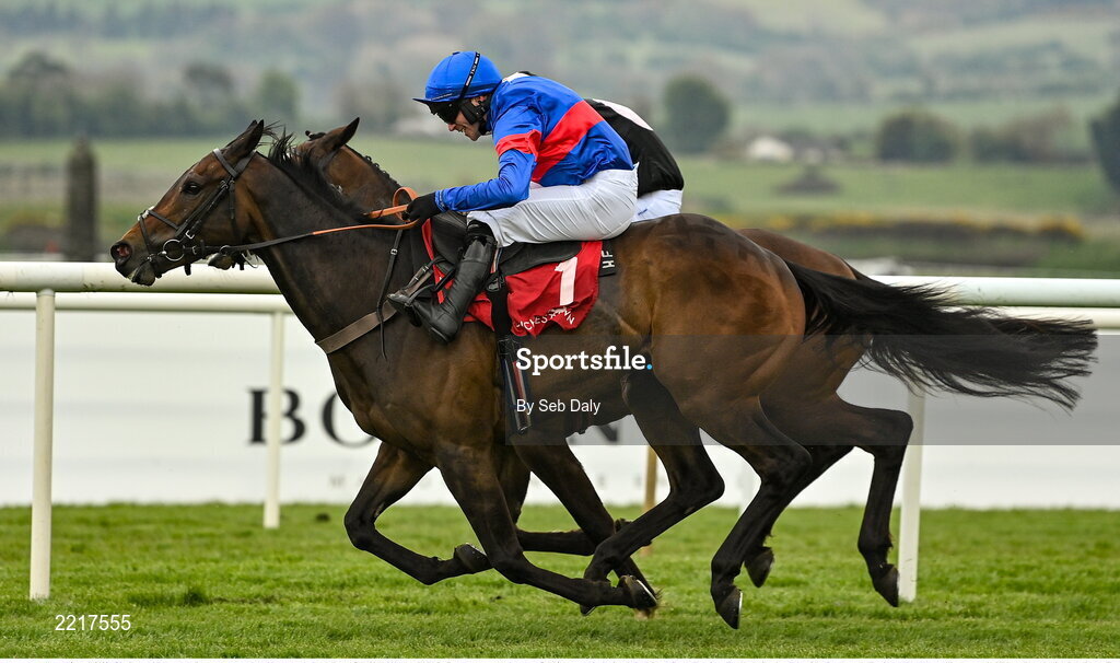 28 April 2022; Gin Coco, with Jonathan Burke up, races alongside eventual winner Broomfield Hall, hidden, with Luke Dempsey up, on their way to finishing second in the Specialist Joinery Group Handicap Hurdle during day three of the Punchestown Festival at Punchestown Racecourse in Kildare. Photo by Seb Daly/Sportsfile