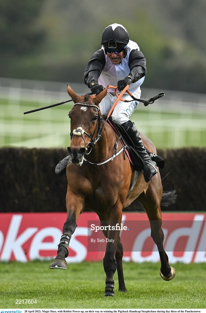 28 April 2022; Magic Daze, with Robbie Power up, on their way to winning the Pigsback Handicap Steeplechase during day three of the Punchestown Festival at Punchestown Racecourse in Kildare. Photo by Seb Daly/Sportsfile