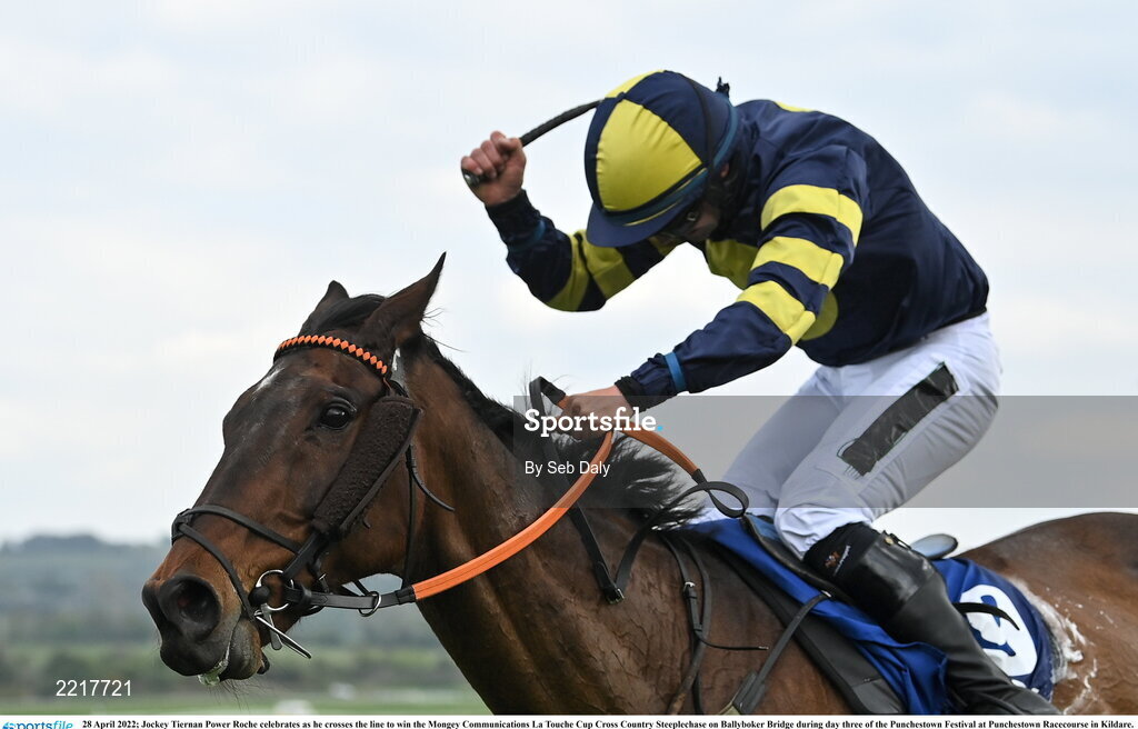 28 April 2022; Jockey Tiernan Power Roche celebrates as he crosses the line to win the Mongey Communications La Touche Cup Cross Country Steeplechase on Ballyboker Bridge during day three of the Punchestown Festival at Punchestown Racecourse in Kildare. Photo by Seb Daly/Sportsfile