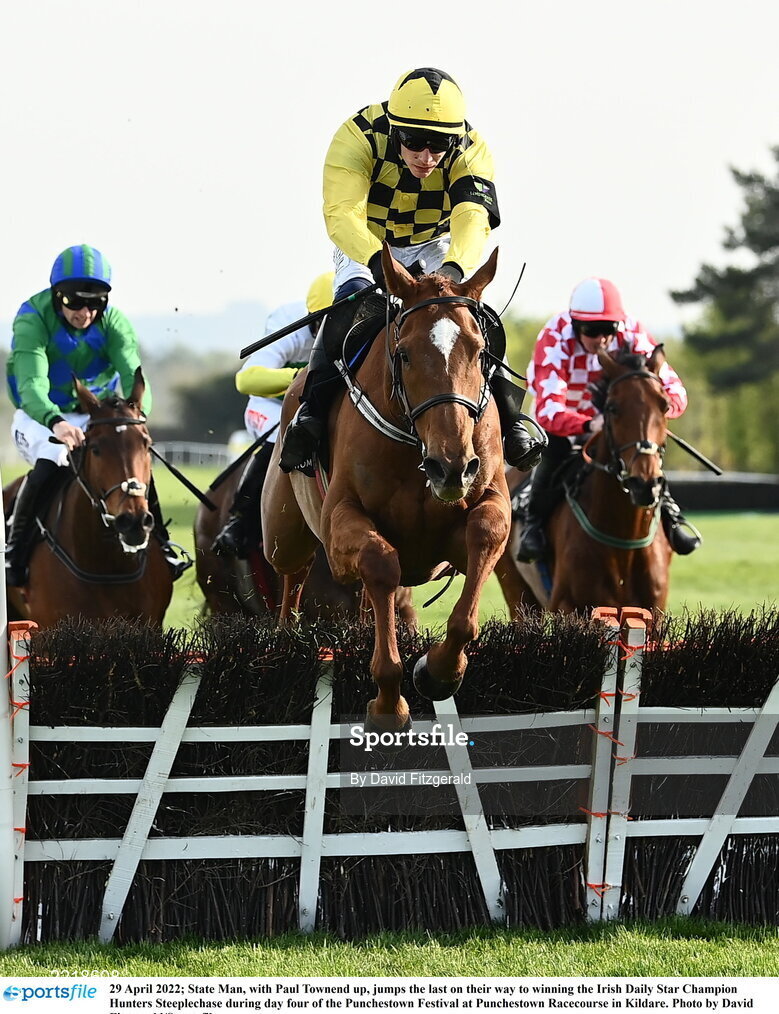 29 April 2022; State Man, with Paul Townend up, jumps the last on their way to winning the Irish Daily Star Champion Hunters Steeplechase during day four of the Punchestown Festival at Punchestown Racecourse in Kildare. Photo by David Fitzgerald/Sportsfile