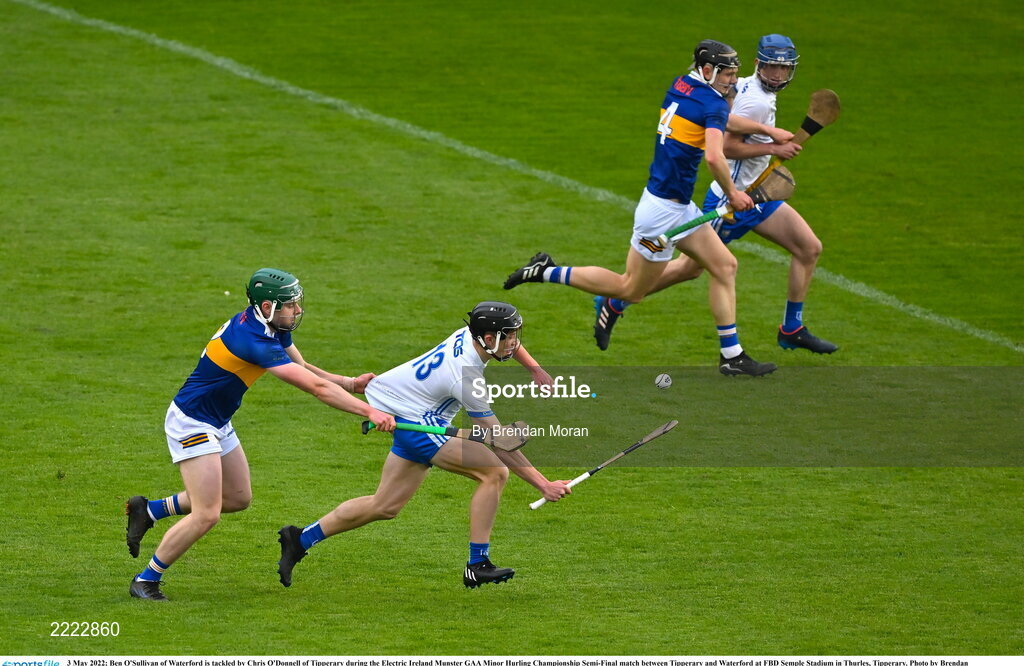 3 May 2022; Ben O'Sullivan of Waterford is tackled by Chris O'Donnell of Tipperary during the Electric Ireland Munster GAA Minor Hurling Championship Semi-Final match between Tipperary and Waterford at FBD Semple Stadium in Thurles, Tipperary. Photo by Brendan Moran/Sportsfile