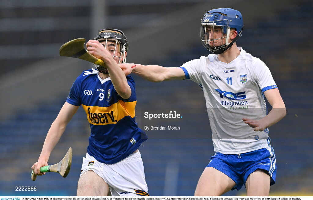 3 May 2022; Adam Daly of Tipperary catches the sliotar ahead of Sean Mackey of Waterford during the Electric Ireland Munster GAA Minor Hurling Championship Semi-Final match between Tipperary and Waterford at FBD Semple Stadium in Thurles, Tipperary. Photo by Brendan Moran/Sportsfile