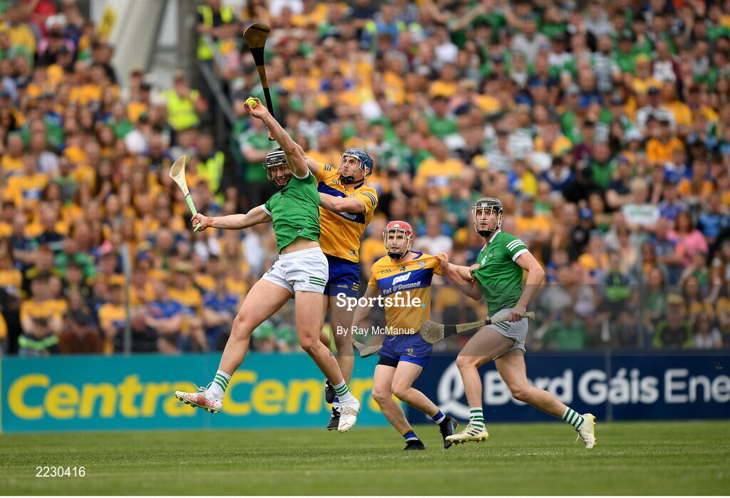 15 May 2022; Gearóid Hegarty of Limerick wins possession ahead of David McInerney of Clare during the Munster GAA Hurling Senior Championship Round 4 match between Clare and Limerick at Cusack Park in Ennis, Clare. Photo by Ray McManus/Sportsfile