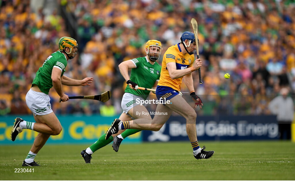 15 May 2022; David Fitzgerald of Clare in action against Séamus Flanagan and Dan Morrisey of Limerick during the Munster GAA Hurling Senior Championship Round 4 match between Clare and Limerick at Cusack Park in Ennis, Clare. Photo by Ray McManus/Sportsfile