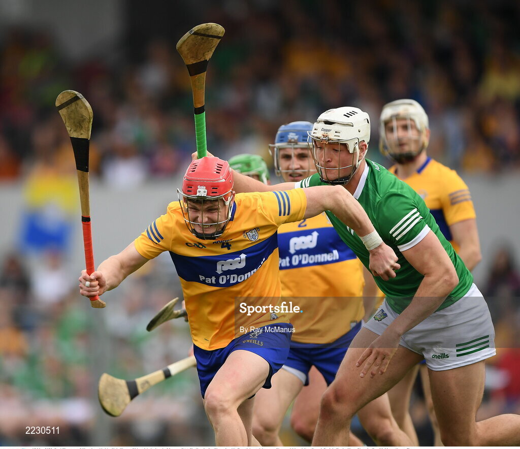 15 May 2022; Paul Flanagan of Clare is tackled by Kyle Hayes of Limerick during the Munster GAA Hurling Senior Championship Round 4 match between Clare and Limerick at Cusack Park in Ennis, Clare. Photo by Ray McManus/Sportsfile
