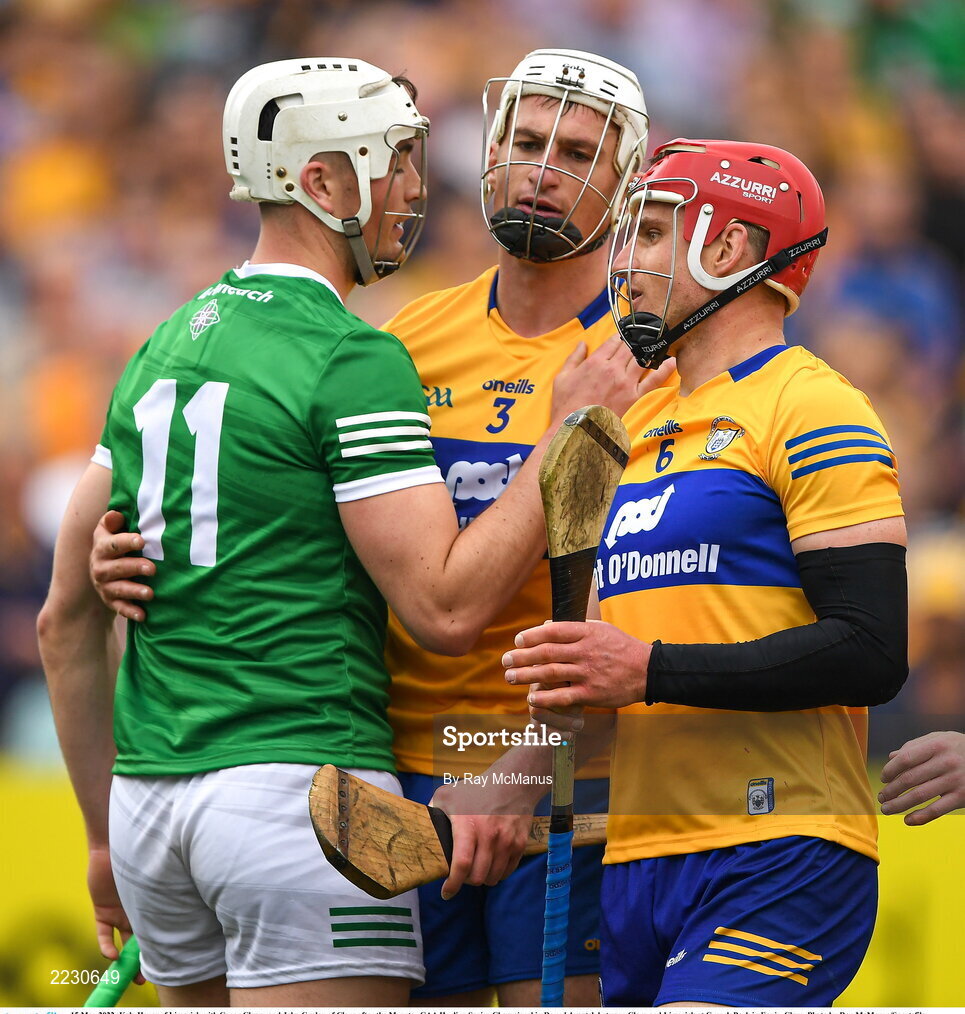 15 May 2022; Kyle Hayes of Limerick with Conor Cleary and John Conlon of Clare after the Munster GAA Hurling Senior Championship Round 4 match between Clare and Limerick at Cusack Park in Ennis, Clare. Photo by Ray McManus/Sportsfile
