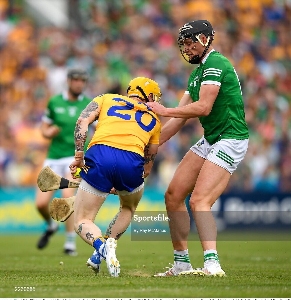 15 May 2022; Aaron Fitzgerald of Clare falls after a clash with Gearóid Hegarty of Limerick during the Munster GAA Hurling Senior Championship Round 4 match between Clare and Limerick at Cusack Park in Ennis, Clare. Photo by Ray McManus/Sportsfile