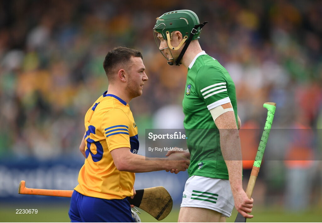 15 May 2022; David Reidy of Clare and William O'Donogue of Limerick shake hands after the Munster GAA Hurling Senior Championship Round 4 match between Clare and Limerick at Cusack Park in Ennis, Clare. Photo by Ray McManus/Sportsfile