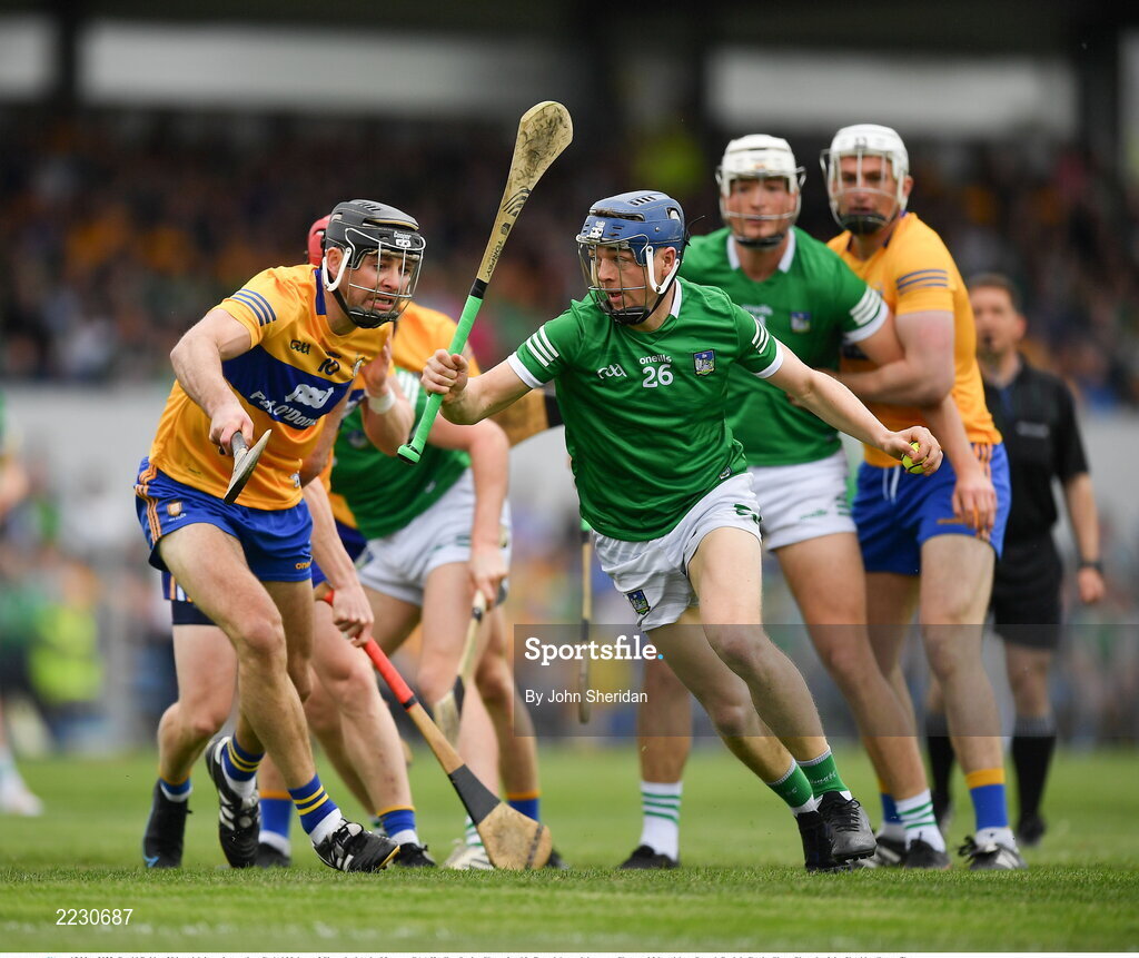 15 May 2022; David Reidy of Limerick in action against Cathal Malone of Clare during the Munster GAA Hurling Senior Championship Round 4 match between Clare and Limerick at Cusack Park in Ennis, Clare. Photo by John Sheridan/Sportsfile