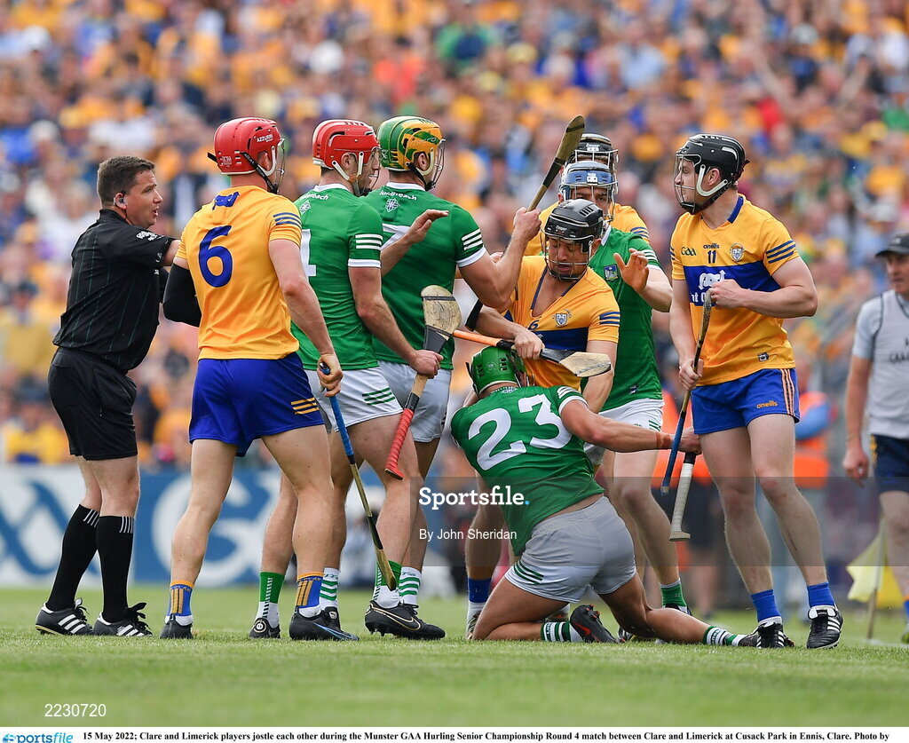 15 May 2022; Clare and Limerick players jostle each other during the Munster GAA Hurling Senior Championship Round 4 match between Clare and Limerick at Cusack Park in Ennis, Clare. Photo by John Sheridan/Sportsfile