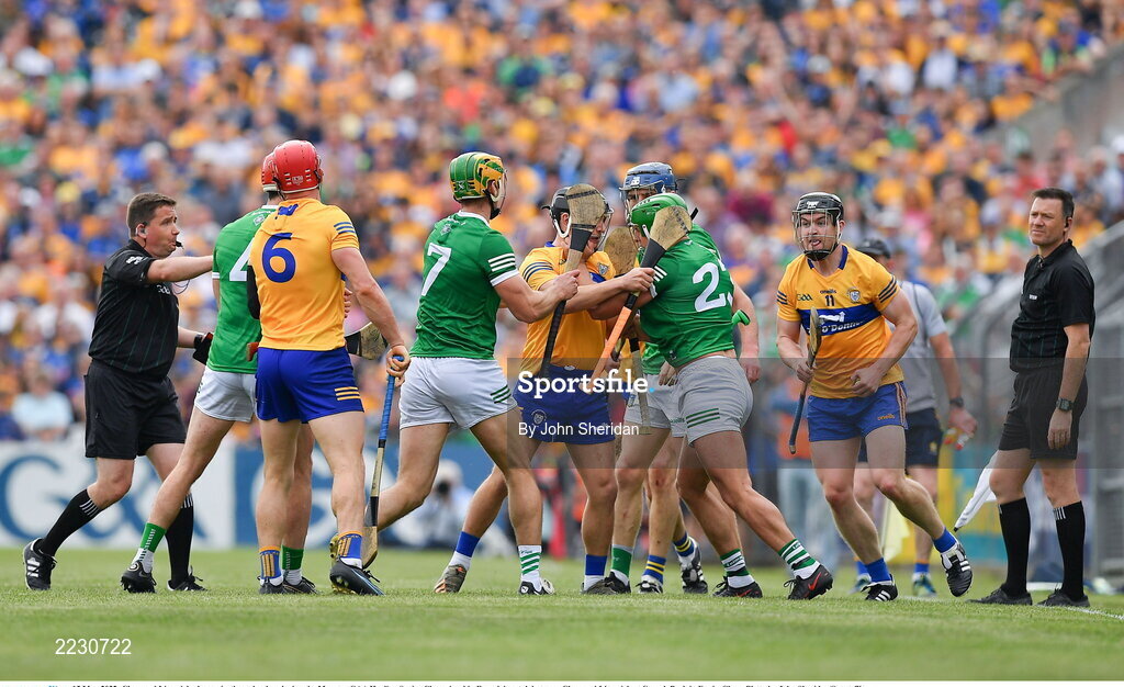 15 May 2022; Clare and Limerick players jostle each other during the Munster GAA Hurling Senior Championship Round 4 match between Clare and Limerick at Cusack Park in Ennis, Clare. Photo by John Sheridan/Sportsfile
