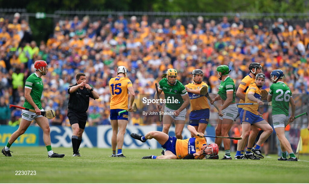 15 May 2022; Clare and Limerick players jostle each other during the Munster GAA Hurling Senior Championship Round 4 match between Clare and Limerick at Cusack Park in Ennis, Clare. Photo by John Sheridan/Sportsfile