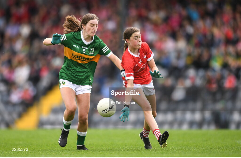 21 May 2022; Lauren Finnegan of Cork in action against Siofra Randles of Kerry during the Ladies Football U14 All-Ireland Platinum Final match between Cork and Kerry at Páirc Uí Rinn in Cork. Photo by Eóin Noonan/Sportsfile