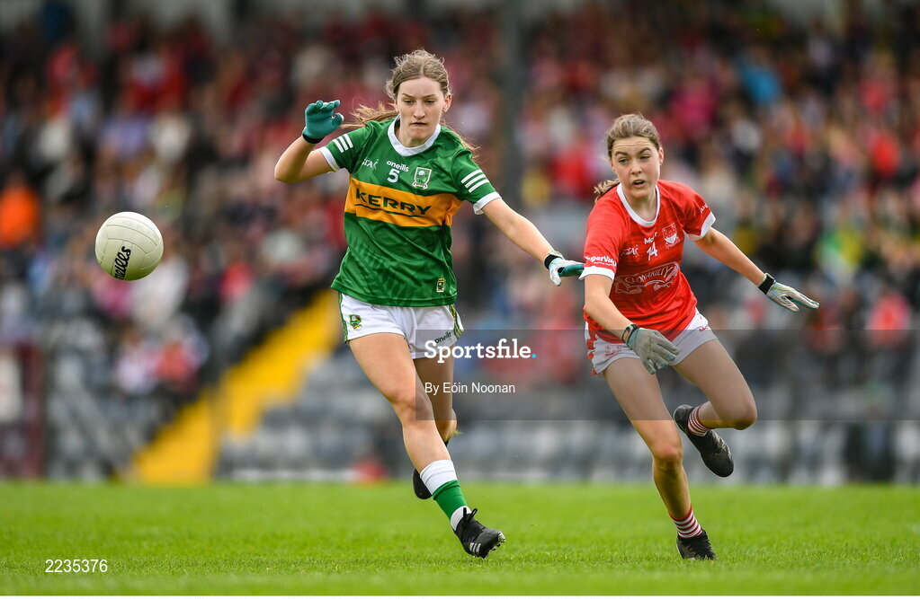 21 May 2022; Lauren Finnegan of Cork in action against Siofra Randles of Kerry during the Ladies Football U14 All-Ireland Platinum Final match between Cork and Kerry at Páirc Uí Rinn in Cork. Photo by Eóin Noonan/Sportsfile