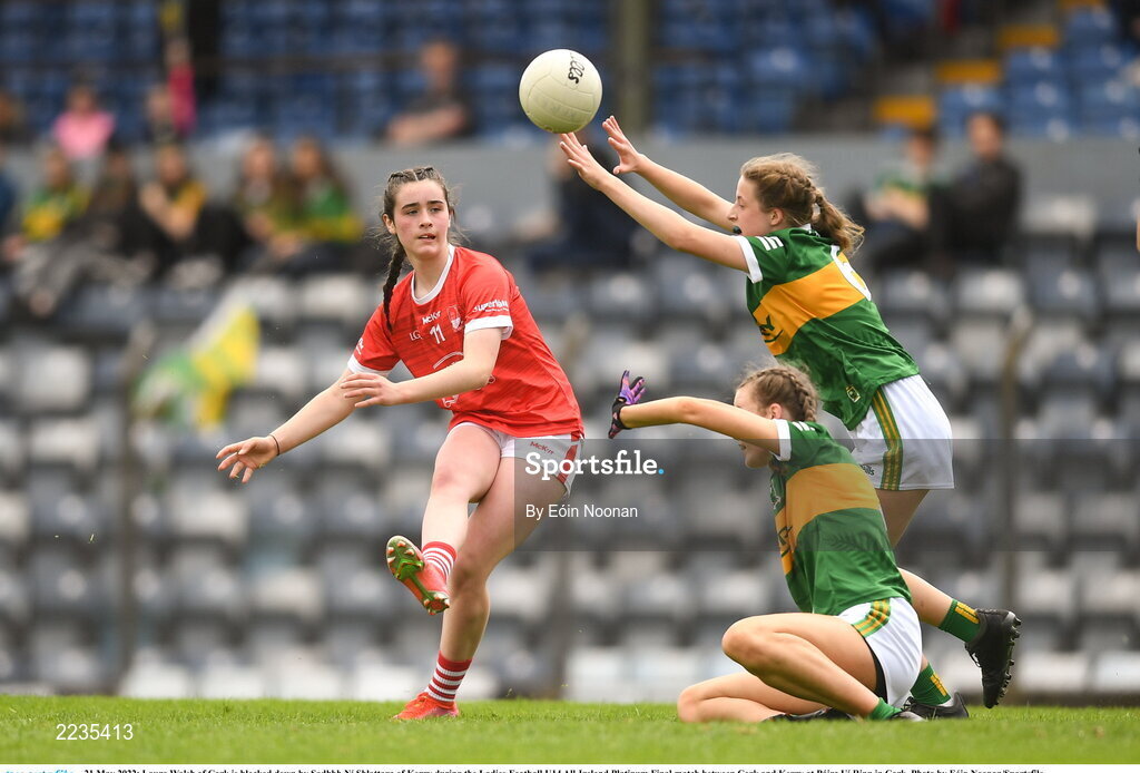 21 May 2022; Laura Walsh of Cork is blocked down by Sadhbh Ní Shlattara of Kerry during the Ladies Football U14 All-Ireland Platinum Final match between Cork and Kerry at Páirc Uí Rinn in Cork. Photo by Eóin Noonan/Sportsfile
