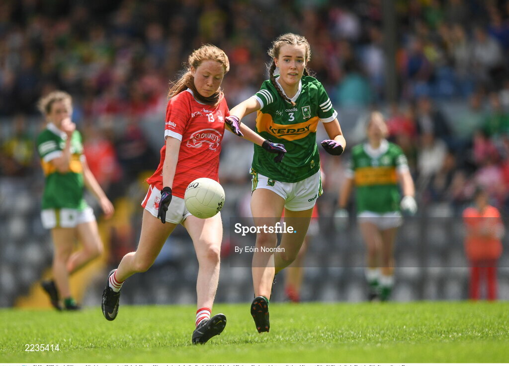21 May 2022; Sarah O'Connor of Cork in action against Clodagh Clancy of Kerry during the Ladies Football U14 All-Ireland Platinum Final match between Cork and Kerry at Páirc Uí Rinn in Cork. Photo by Eóin Noonan/Sportsfile
