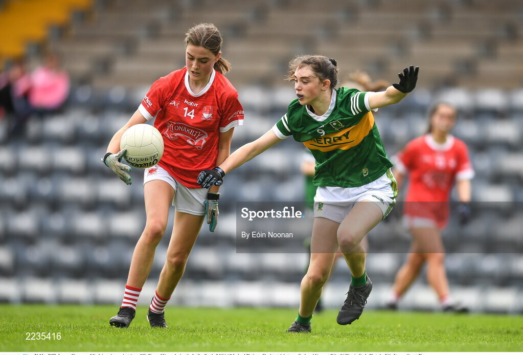 21 May 2022; Lauren Finnegan of Cork in action against Anna O'Sullivan of Kerry during the Ladies Football U14 All-Ireland Platinum Final match between Cork and Kerry at Páirc Uí Rinn in Cork. Photo by Eóin Noonan/Sportsfile
