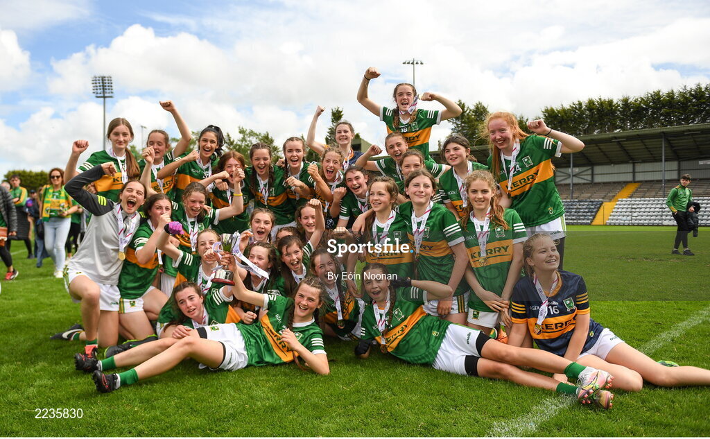 21 May 2022; Kerry players celebrate with the cup after the Ladies Football U14 All-Ireland Platinum Final match between Cork and Kerry at Páirc Uí Rinn in Cork. Photo by Eóin Noonan/Sportsfile