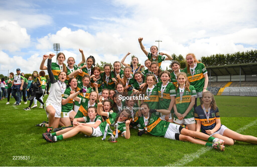21 May 2022; Kerry players celebrate with the cup after the Ladies Football U14 All-Ireland Platinum Final match between Cork and Kerry at Páirc Uí Rinn in Cork. Photo by Eóin Noonan/Sportsfile