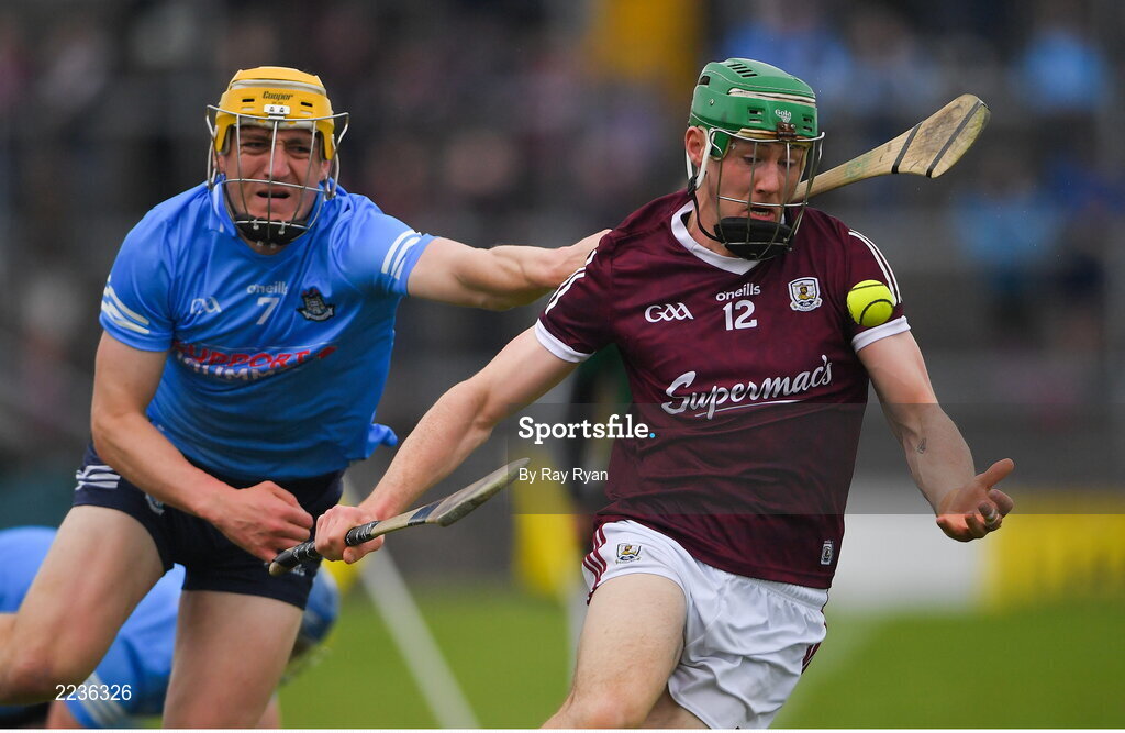 21 May 2022; Cianan Fahy of Galway in action against Daire Gray of Dublin during the Leinster GAA Hurling Senior Championship Round 5 match between Galway and Dublin at Pearse Stadium in Galway. Photo by Ray Ryan/Sportsfile