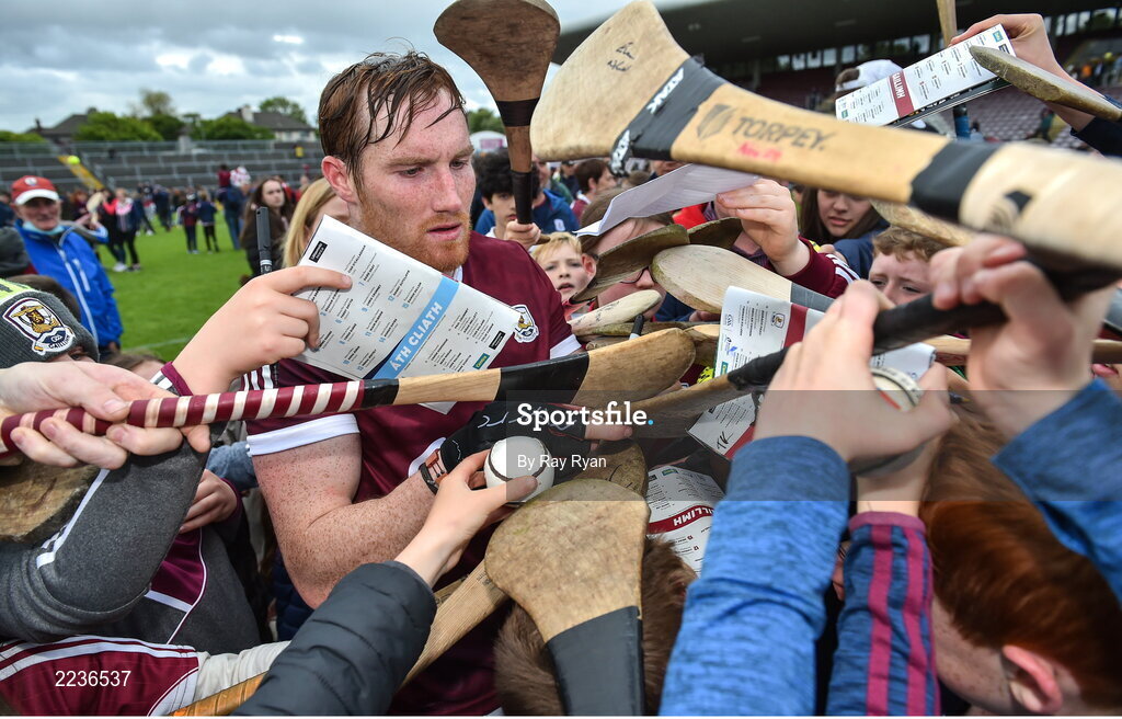 21 May 2022; Conor Whelan of Galway tries to sign his autograph for young supporters after the Leinster GAA Hurling Senior Championship Round 5 match between Galway and Dublin at Pearse Stadium in Galway. Photo by Ray Ryan/Sportsfile