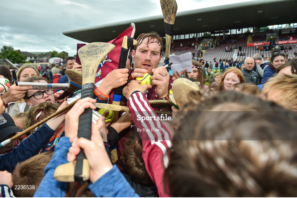 21 May 2022; Conor Whelan of Galway tries to sign his autograph for young supporters after the Leinster GAA Hurling Senior Championship Round 5 match between Galway and Dublin at Pearse Stadium in Galway. Photo by Ray Ryan/Sportsfile