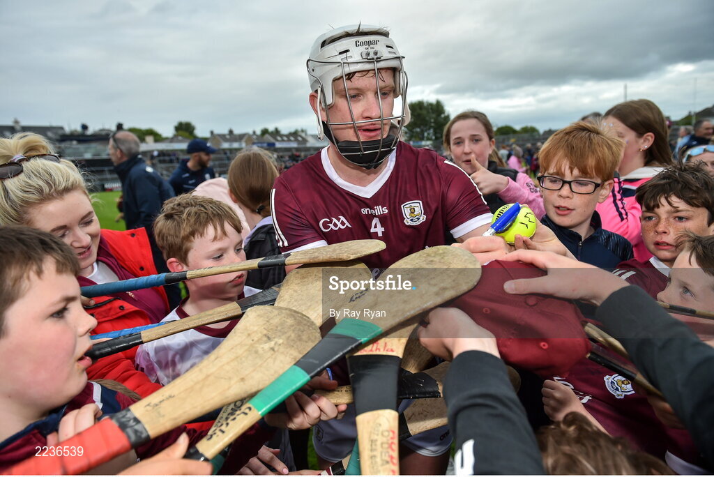 21 May 2022; Darren Morrissey of Galway signs his autograph for young supporters after the Leinster GAA Hurling Senior Championship Round 5 match between Galway and Dublin at Pearse Stadium in Galway. Photo by Ray Ryan/Sportsfile