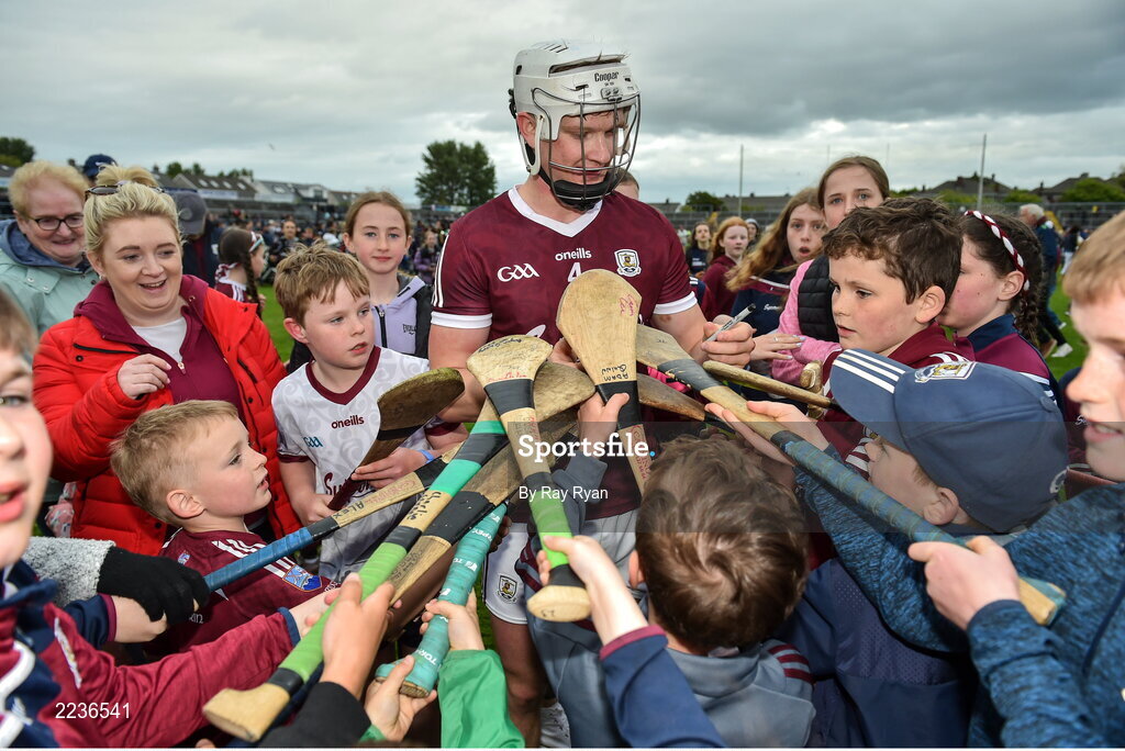 21 May 2022; Darren Morrissey of Galway signs his autograph for young supporters after the Leinster GAA Hurling Senior Championship Round 5 match between Galway and Dublin at Pearse Stadium in Galway. Photo by Ray Ryan/Sportsfile