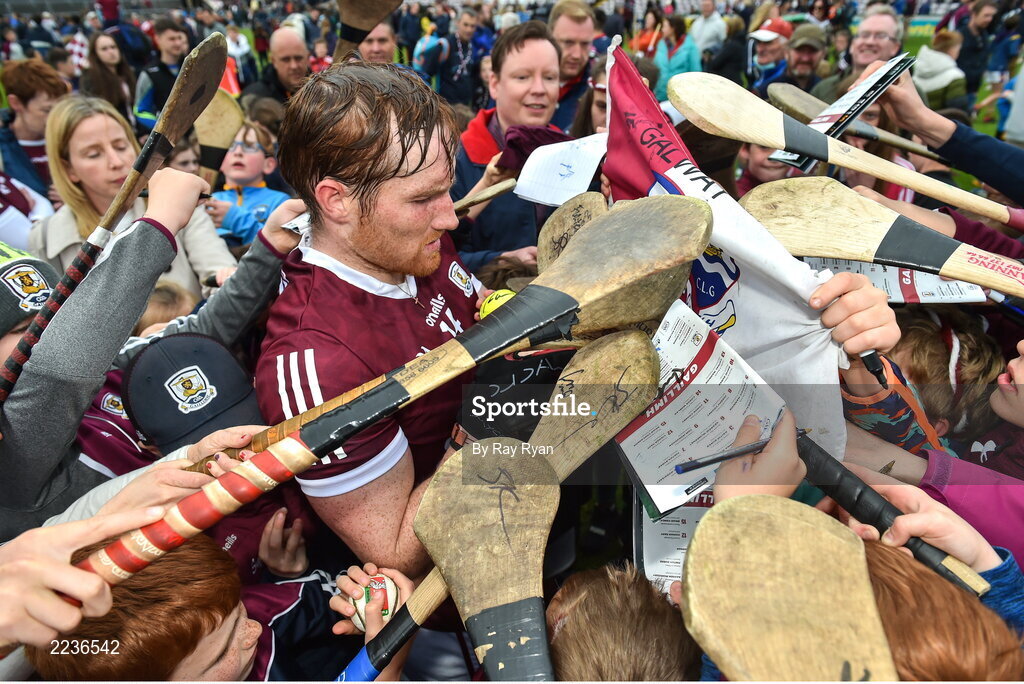 21 May 2022; Conor Whelan of Galway tries to sign his autograph for young supporters after the Leinster GAA Hurling Senior Championship Round 5 match between Galway and Dublin at Pearse Stadium in Galway. Photo by Ray Ryan/Sportsfile