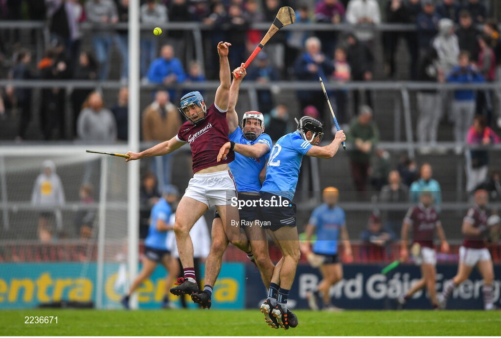 21 May 2022; Conor Cooney of Galway in action against Paddy Smith and Danny Sutcliffe of Dublin during the Leinster GAA Hurling Senior Championship Round 5 match between Galway and Dublin at Pearse Stadium in Galway. Photo by Ray Ryan/Sportsfile