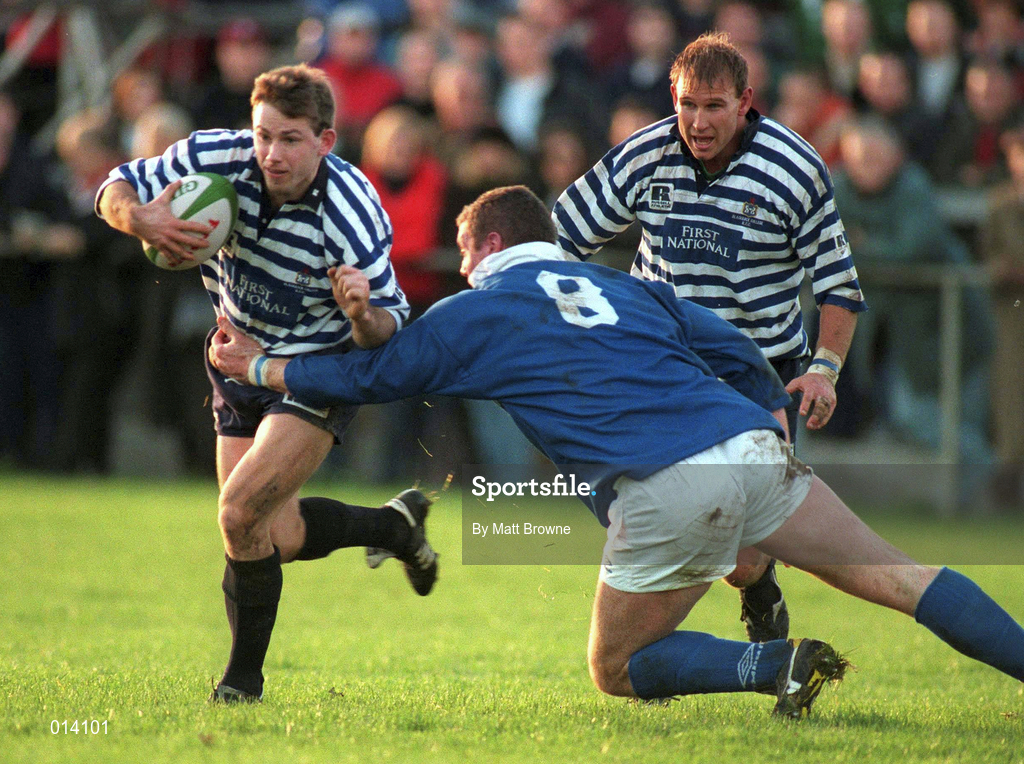 22 November 1997: Alan McGowan of Blackrock is tackled by Victor Costello of St Mary's College during the AIB All Ireland League Division 1 match between Blackrock and St Mary's College at Templeville Road in Dublin. Photo by Matt Browne/Sportsfile