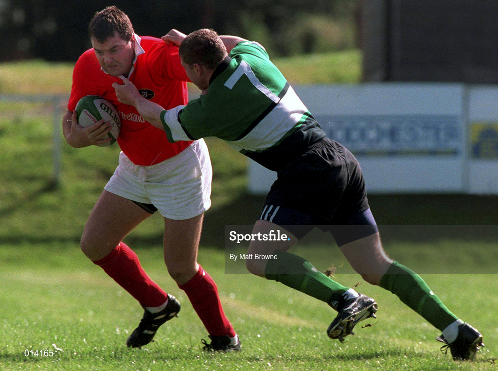 12 September 1998: Anthony Foley of Munster is tackled by Shane McEntee of Connacht during the Guinness Interprovincial Rugby Championship match between Munster and Connacht at Dooradoyle in Limerick. Photo by Matt Browne/Sportsfile