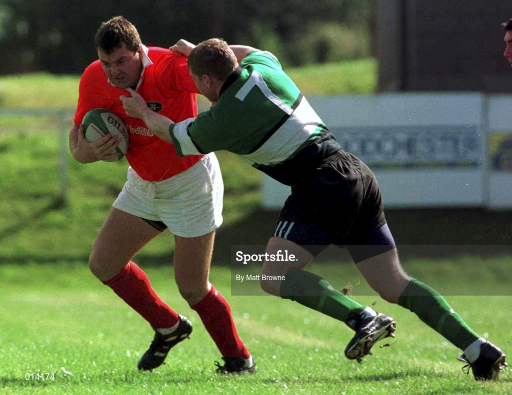 12 September 1998: Anthony Foley of Munster is tackled by Shane McEntee of Connacht during the Guinness Interprovincial Rugby Championship match between Munster and Connacht at Dooradoyle in Limerick. Photo by Matt Browne/Sportsfile