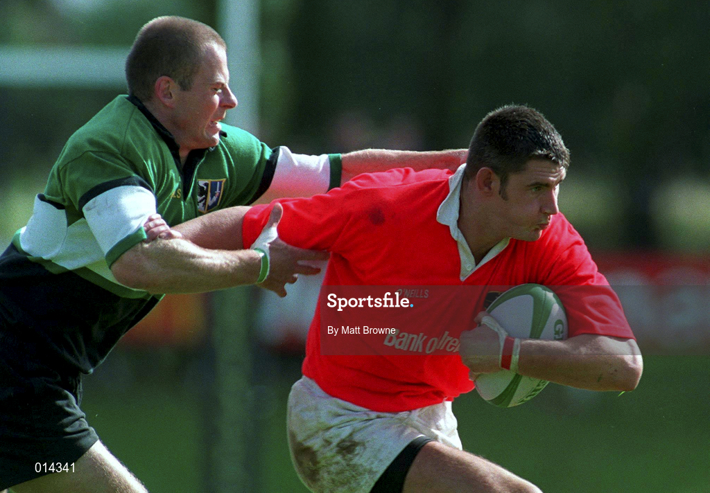 12 September 1998: Eddie Haley of Munster is tackled by Mervyn Murphy of Connacht during the Guinness Interprovincial Rugby Championship match between Munster and Connacht at Dooradoyle in Limerick. Photo by Matt Browne/Sportsfile