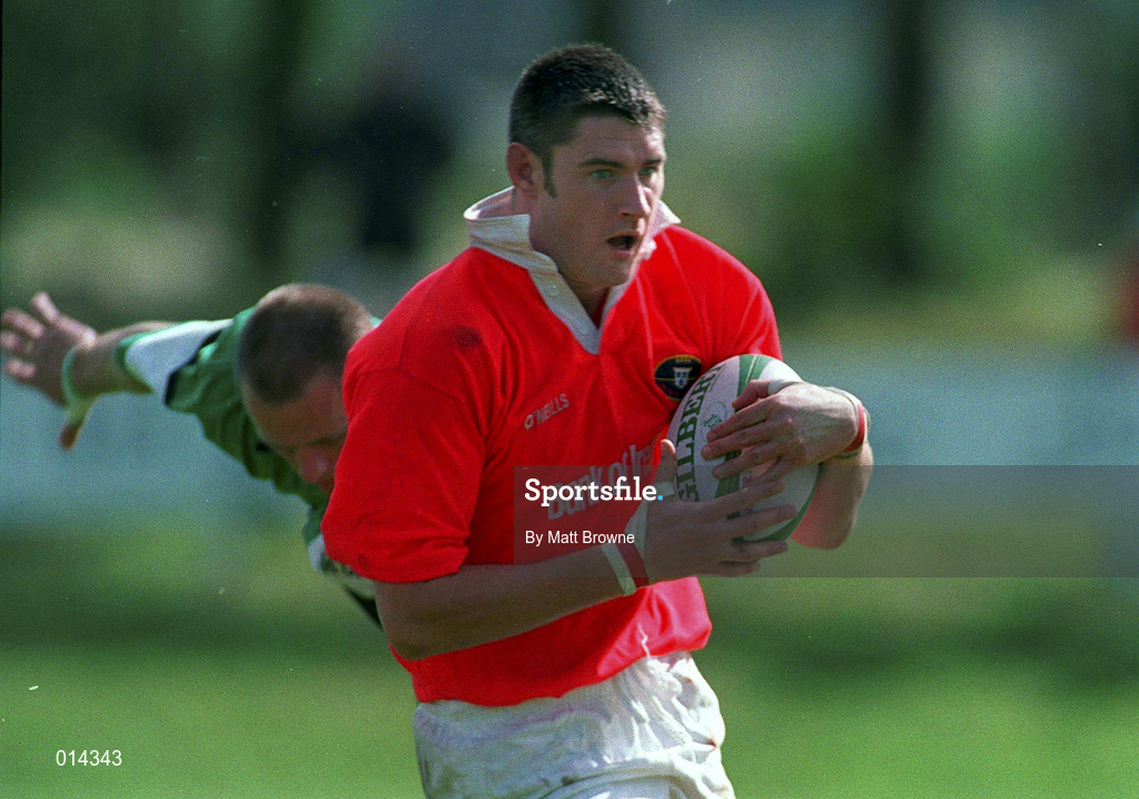 12 September 1998: Eddie Haley of Munster is tackled by Mervyn Murphy of Connacht during the Guinness Interprovincial Rugby Championship match between Munster and Connacht at Dooradoyle in Limerick. Photo by Matt Browne/Sportsfile