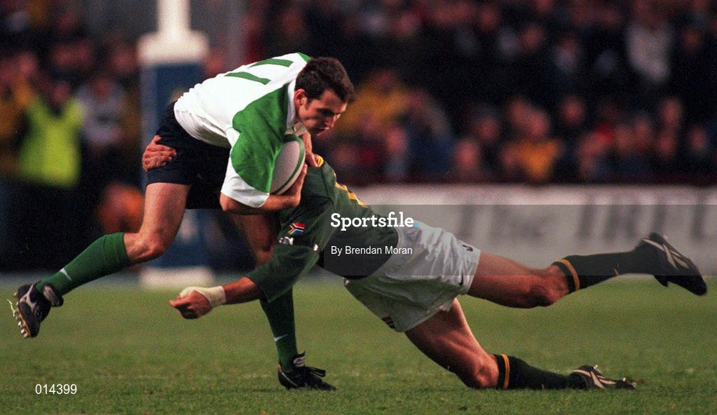 28 November 1998; Girvan Dempsey of Ireland is tackled by Andre Snyman of South Africa during a International Friendly Match between Ireland and South Africa at Landsdowne Road in Dublin. Photo by Brendan Moran/Sportsfile