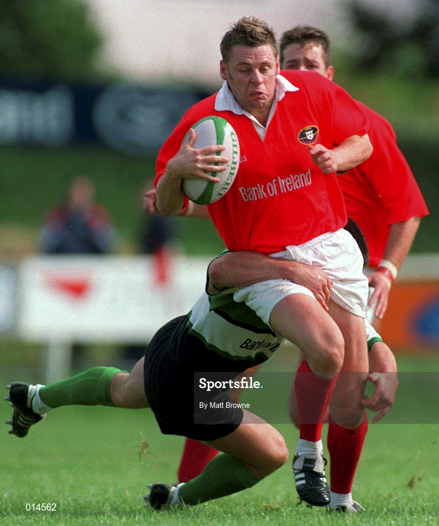 12 September 1998: Killian Keane of Munster is tackled by Simon Allnutt of Connacht during the Guinness Interprovincial Rugby Championship match between Munster and Connacht at Dooradoyle in Limerick. Photo by Matt Browne/Sportsfile