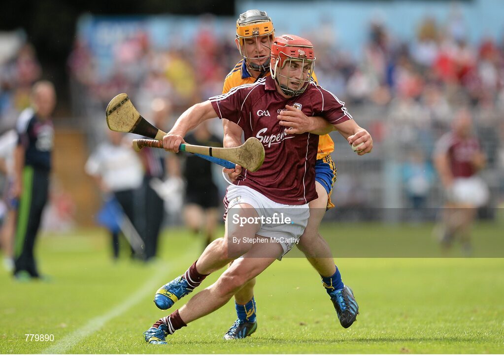 28 July 2013; Jason Grealish, Galway, is tackled by John Conlon, Clare. GAA Hurling All-Ireland Senior Championship, Quarter-Final, Galway v Clare, Semple Stadium, Thurles, Co. Tipperary. Picture credit: Stephen McCarthy / SPORTSFILE
