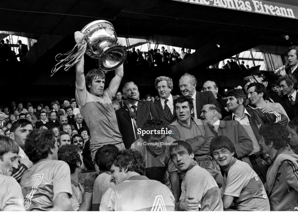 20 September 1981; Kerry captain Jimmy Deenihan lifts the Sam Maguire Cup, in the company of An Taoiseach Garret FitzGerald, TD, GAA president Paddy McFlynn and teammates, including Ger Power, Denis Ogie Moran, John Egan, manager Mick O'Dwyer and Tim Kennelly, following victory in the All-Ireland Football Final match between Kerry and Offaly at Croke Park in Dublin. Photo by Connolly Collection/Sportsfile