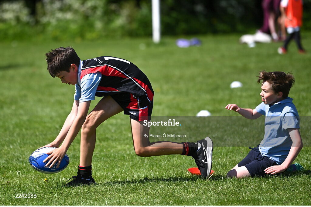 27 May 2022; Conor Pinlott of Saint Olaf's National School in Balally, Dublin, scores a try during the Leinster Rugby Touch Rugby Event at Marlay Park in Dublin. Photo by Piaras Ó Mídheach/Sportsfile