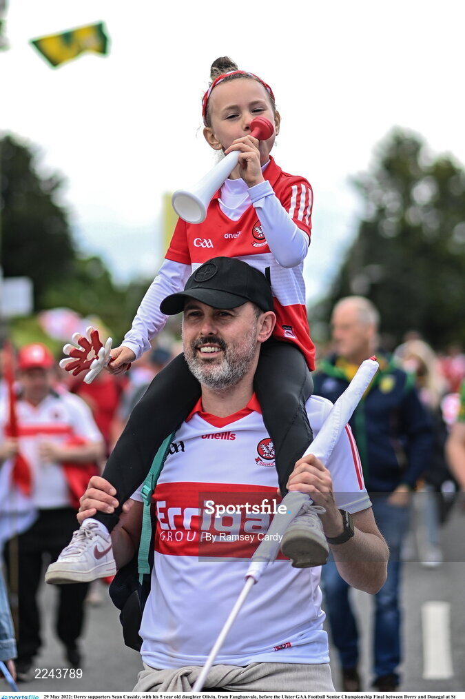 29 May 2022; Derry supporters Sean Cassidy, with his 5 year old daughter Olivia, from Faughanvale, before the Ulster GAA Football Senior Championship Final between Derry and Donegal at St Tiernach's Park in Clones, Monaghan. Photo by Ramsey Cardy/Sportsfile