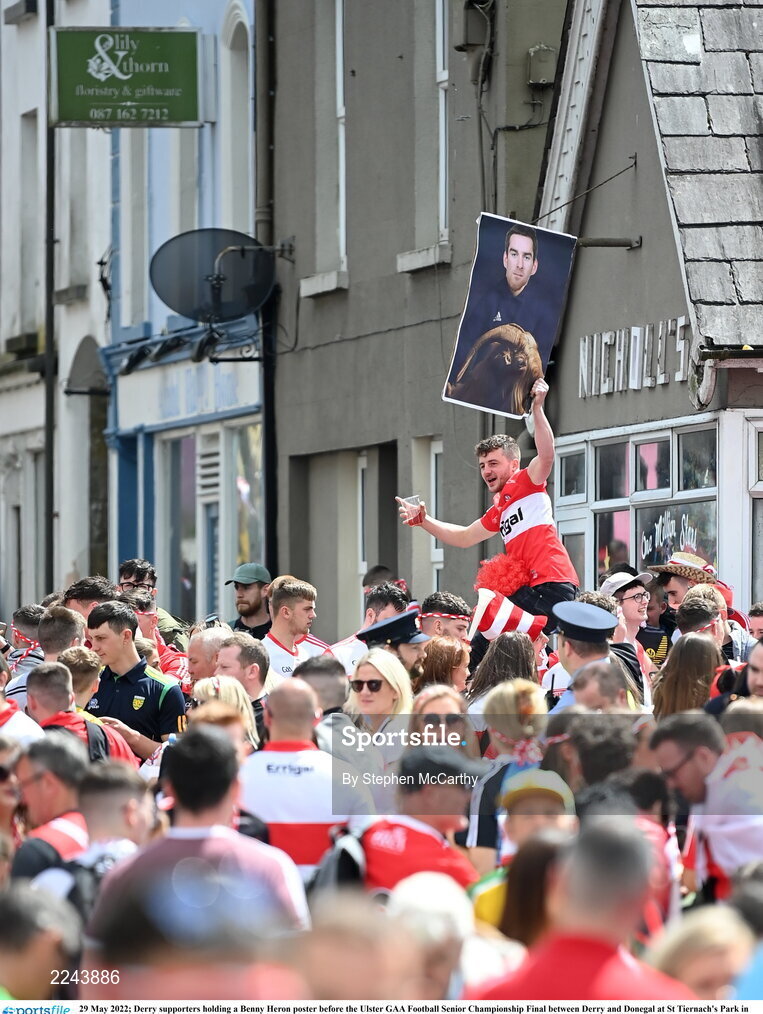 29 May 2022; Derry supporters holding a Benny Heron poster before the Ulster GAA Football Senior Championship Final between Derry and Donegal at St Tiernach's Park in Clones, Monaghan. Photo by Stephen McCarthy/Sportsfile