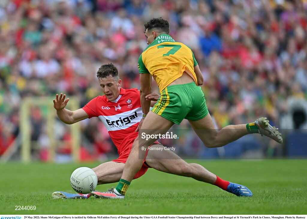 29 May 2022; Shane McGuigan of Derry is tackled by Odhran McFadden Ferry of Donegal during the Ulster GAA Football Senior Championship Final between Derry and Donegal at St Tiernach's Park in Clones, Monaghan. Photo by Ramsey Cardy/Sportsfile