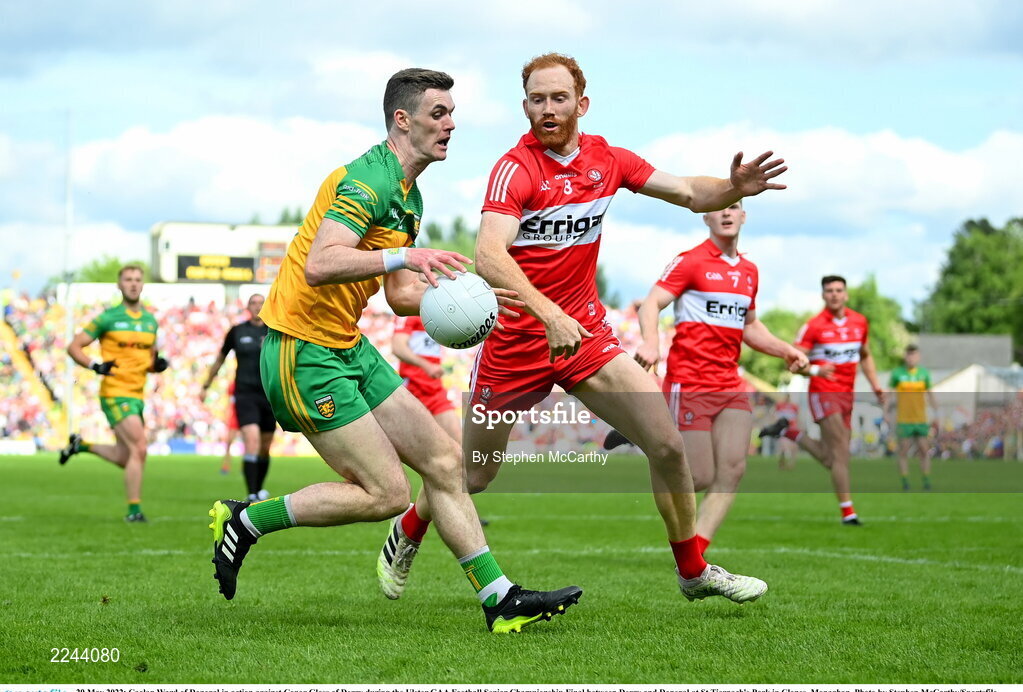 29 May 2022; Caolan Ward of Donegal in action against Conor Glass of Derry during the Ulster GAA Football Senior Championship Final between Derry and Donegal at St Tiernach's Park in Clones, Monaghan. Photo by Stephen McCarthy/Sportsfile