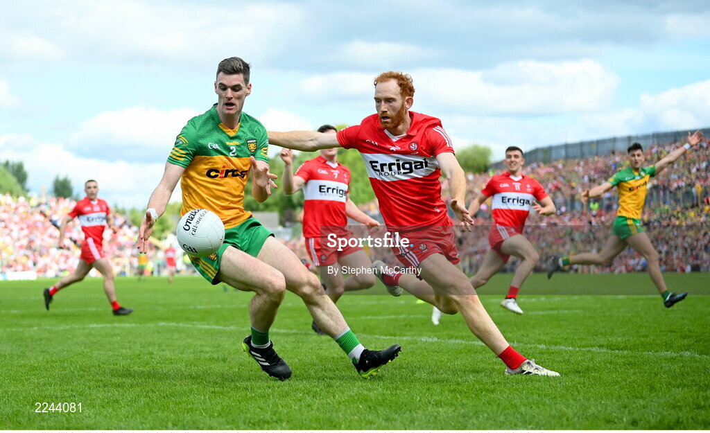 29 May 2022; Caolan Ward of Donegal in action against Conor Glass of Derry during the Ulster GAA Football Senior Championship Final between Derry and Donegal at St Tiernach's Park in Clones, Monaghan. Photo by Stephen McCarthy/Sportsfile