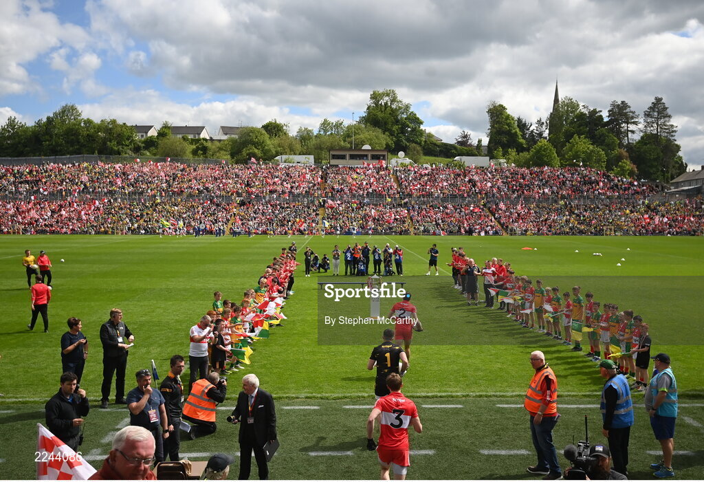 29 May 2022; Derry players runs out for the Ulster GAA Football Senior Championship Final between Derry and Donegal at St Tiernach's Park in Clones, Monaghan. Photo by Stephen McCarthy/Sportsfile