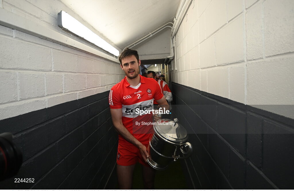29 May 2022; Christopher McKaigue of Derry brings the Anglo Celt Cup to his team's dressing room after the Ulster GAA Football Senior Championship Final between Derry and Donegal at St Tiernach's Park in Clones, Monaghan. Photo by Stephen McCarthy/Sportsfile